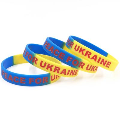 China 12mm Waterproof Peace With Love Rubber Ink Injected Wristband Bracelet Rubber Peace Custom For Ukraine Silicone Rubber Wristband for sale