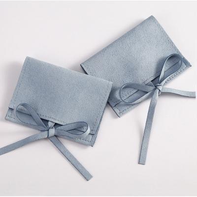 China Durable Chic Jewelry Velvet Pouch Folding Bag Envelope Gift Bags With Bow Closure for sale