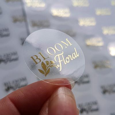 China Low MOQ Transparent Waterproof Sticker Packing Sheet With Logo Label Die Cut Shape for sale