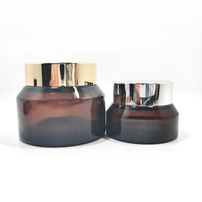 China Brown Cosmetic High Quality Glass Face Creamy Cosmetic Jar With Yellow Lids 50ml for sale