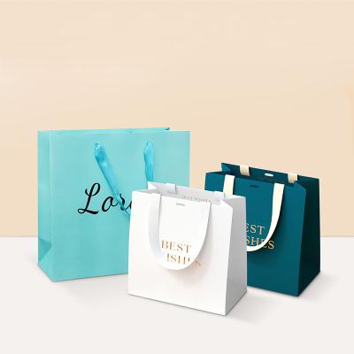 China Recyclable Luxury Large Gift Bag Art Paper Shopping Bags With Ribbon For Kids Toys for sale