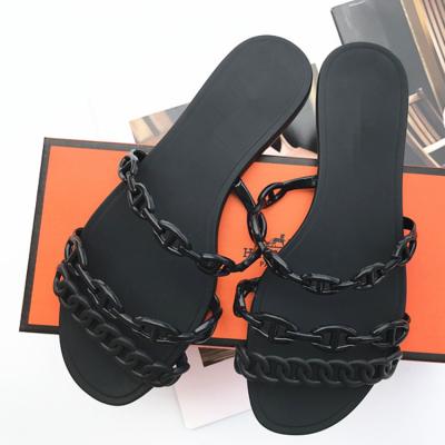 China Chic Female Flat Open Toe Slippers H Flat Female Flat Ins Flat Toe Anti-Smell Shoes Wholesaler Summer Beach Jelly Slippers One-Piece Garment For Women for sale