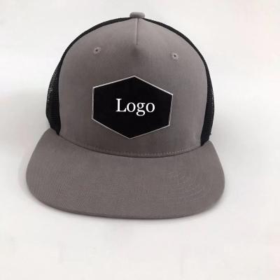 China 5 Custom JOINT Mesh Flat Bill Hats Gorras Logo Metal Label Trucker Hat Snapback Panel Back Hats For Men for sale