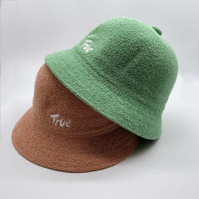 China 2021 Character Hot Sale Premium Designer Women Custom Terry Towel Bucket Hat With Single Button Top for sale