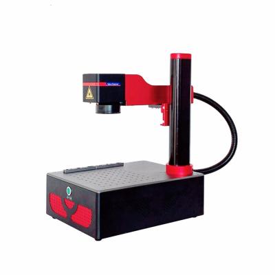 China 20w 30w 50w 100w Folding Fiber Laser Marking Machine For Metal Marking for sale