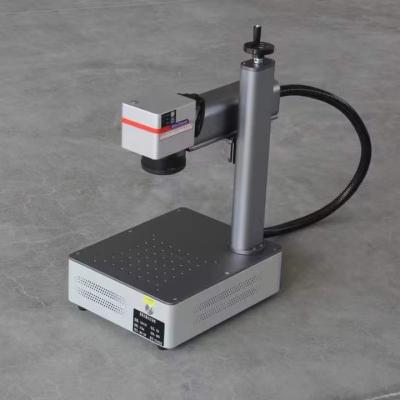 China Cypcut Control System 20W-100W Portable Mini Fiber Laser Marking Machine for Engraving Metal Plastic Pen Gold Silver Jewelry for sale