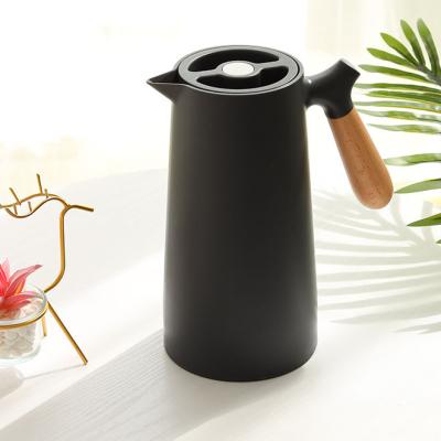 China Viable Nordic Wood Handle Insulation Hot Water Pot Glass Liner Vacuum Coffee Pot Thermos Kettle for sale