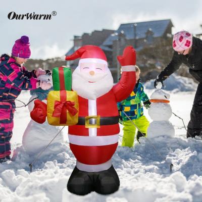 China OurWarm Durable and Festive Wholesale Outdoor Christmas Santa Claus With Light 5FT Inflatable Christmas Decorations Supplies for sale