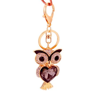 China Fashionable Large Crystal Owl Keychain Champagne Rhinestone Car Keychain Women Bag Accessories Rhinestone Key Chain for sale