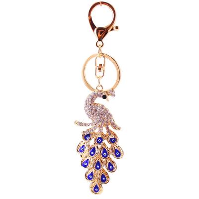 China Peacock Eye Key Chain Car Fashion Gift Alloy Keyfob Hanging Rhinestone Bag Exquisite Pendant Key Chain Fashionable Magic Eye Creative for sale