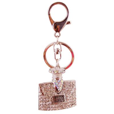 China Fashionable Rhineston Crystal Charm Pendant Chain Perfume Perfume Bottle Keychain for sale