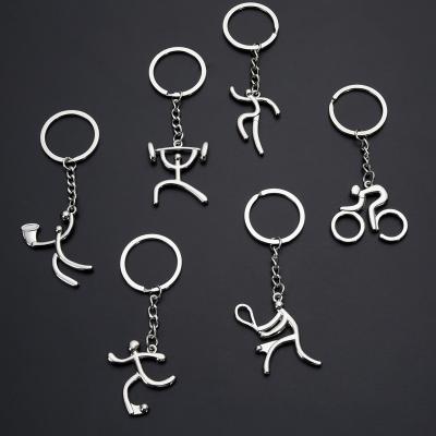 China Creative Fashion Metal Man Road Bicycle Figure Key Chain Sports Casual Souvenirs For Bike Lover Cyclist Recycling Key Ring for sale