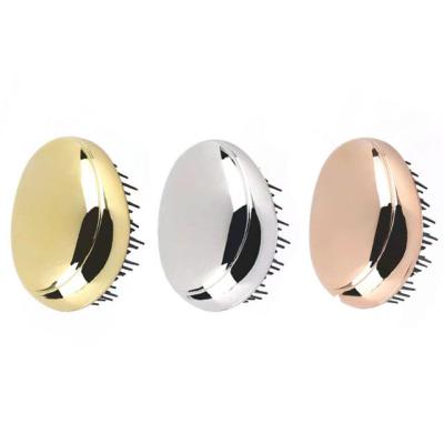 China Hotel Plastic Soft Egg Hair Brush Tooth Massage Comb with Plating Straight Curly Hair Brush with Detangling for sale