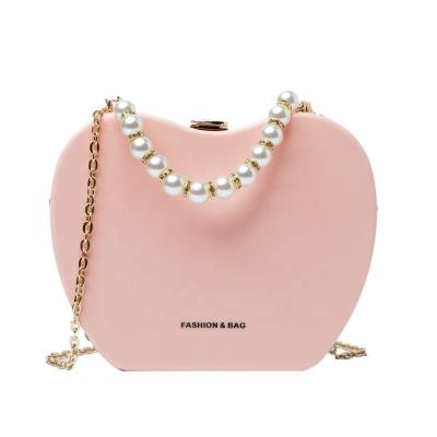 China 2021 Fashion Candy Color Pearl Mini Handle Jelly Mini PVC Purse Apple Heart Shape Women Handbags Ladies Handbags Small for sale