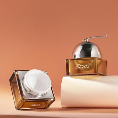 China Newest Skin Care 50g Square Cosmetic Jar Luxury Cosmetic Plastic Cream Jar With Metal Spoon for sale