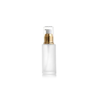 China Cosmetic Lotion Bottle Glass Base Frosted Glass Liquid Bottle With Lotion PUMP for sale