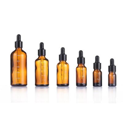 China Brown Cosmetic Glass Empty Bottle Wholesale Essential Oil Cosmetic Sub-bottling Bottle With Scale Dropper for sale