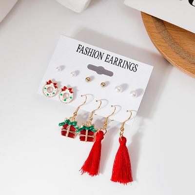 China 2021 Vintage Christmas Santa Bell Unicorn Hat Snowflake Snowflake Elk Reindeer Tree Dangling Earrings for sale