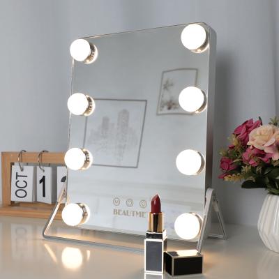 China Small Size Hollywood Lighted Lighted Makeup Mirror Vanity Makeup Mirror With 3 Color Dimmable Light Smart Touch Control Light for sale