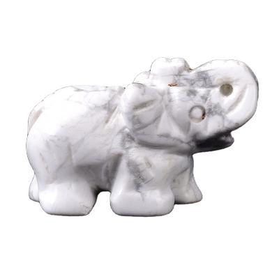 China Wholesale Globe Hand Carved Natural Crystal Elephant Howlite Animals Energy Stone For Crafts Ornaments for sale