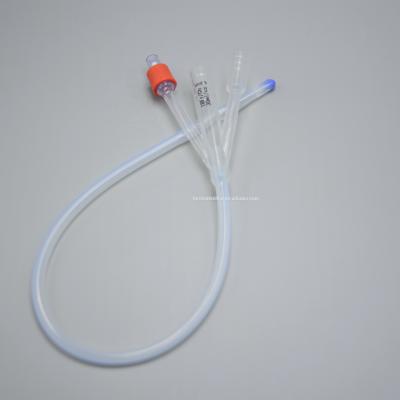 China Three Way Single Use Silicone Foley Material Catheter for sale