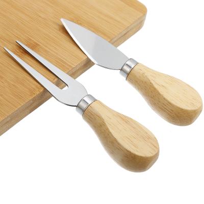 China Small Disposable Wood Material Pizza Cheese Cutting Board With Knife And Fork Set for sale