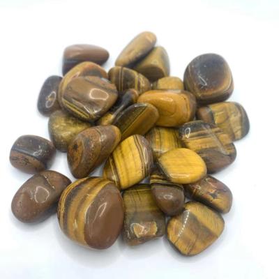 China China Wholesale Tiger Eye Quartz Turn Rolling Opener Semi Tumbled Mineral Stones Crystal Gravel Big for sale