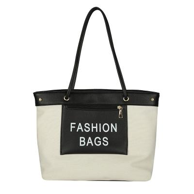 China 2022 Fashion Canvas Custom Logo Premium Canvas Traveler Women Printing Tote Bag for sale