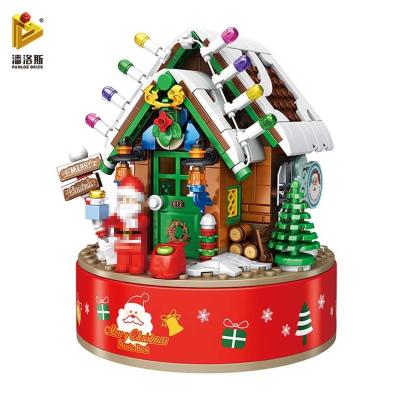 China DIY 502pcs Santa Claus Snowman Cabin Building Blocks Brick PANLOS 656012 Christmas Hut Building Music Box for sale