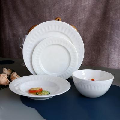 China Sustainable Bone China Dinnerware White Ceramic Bone China Embossed Custom Restaurant Dinnerware Sets For Hotel for sale