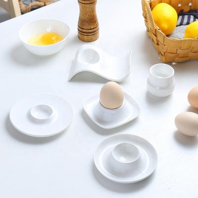 China Durable Ceramic Egg Cups Porcelain Egg Holder Racks For Hard Boiled Eggs Fit Shape Safe for sale