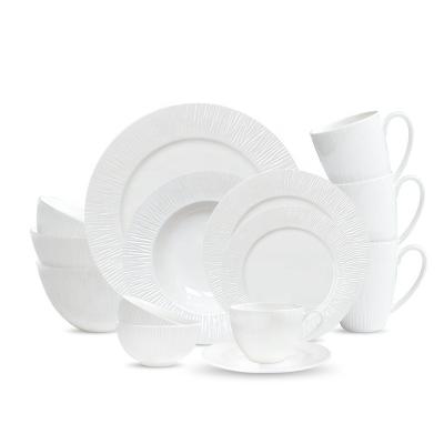 China Hot Sustainable Amazon Spun White Dinner Set Embossed Fine Bone China Dinner Care Dinnerware Sets for sale