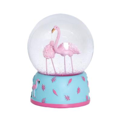 China Pretty Africa Flamingo Snow Globe Wedding Favors Custom Snow Globe Manufactures for sale