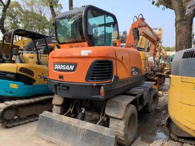 China Used Doosan DX60W Wheel Excavator In Excellent Condition/Used Doosan Mini Wheel Excavator For Sale for sale