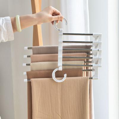 China Hot Sale New Stainless Steel Cheap Wardrobe Multilayer Milk White Folding Pants Hanger Eco-friendly Space Saving for sale