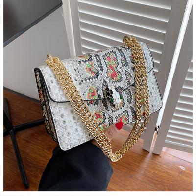 China 2022 high quality famous brand serpentine luxury women cross - body bags ladies messenger handbags for sale