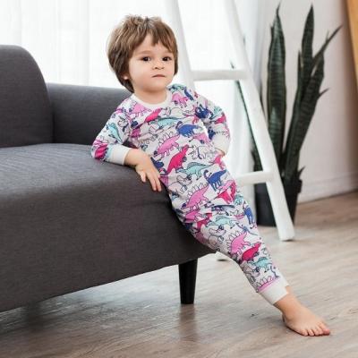 China Breathe Free Posh Cartoon Dinosaur Printing Pajamas Children Clothing Cotton Kids Sets Pajamas Kids Sets Wholesale/ODM/OEM for sale