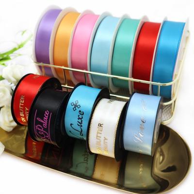 China Sustainable custom logo gold silver foil soild color silk satin ribbon custom printed for sale