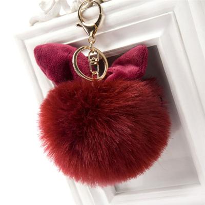 China Eco-Friendly Ear Shaped Key Ring Charm Keychain Pompom Rabbit Purse Pendant Bag Keychains for sale