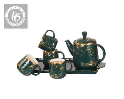 China Viable Custom Decorative Porcelain Tea Cup And Saucer Decorative Dark Green Gold Ceramic Decal Logo Set for sale