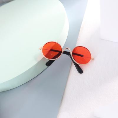 China Hot Selling High Quality Viable Round Pet Glasses Pet Sunglasses Cat Color Mirror Radiation Protection Round Glass for sale