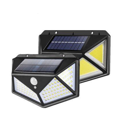 China Garden Lights 100 LED 3 Modes Outdoor Solar Powered Motion Sensor Light IP65 Security Wireless Waterproof Wall Lamp for sale