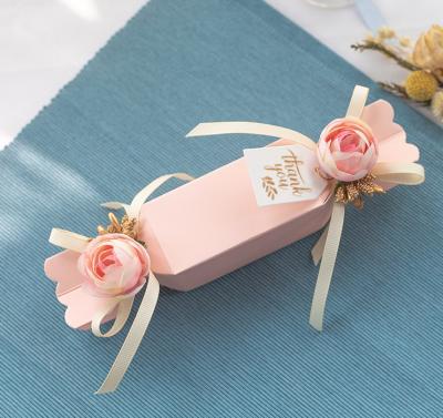 China Recycled Materials Wedding Sweet Gift Box Chocolate Packaging Box With Bow For Christmas Holiday Goodie Paper Boxes for sale