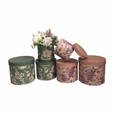 China Recycled Materials 3pcs Round Cardboard Flower Box For Layout Rose With Handle Round Hat Flower Gift Package Box Round Cardboard Floral Box for sale