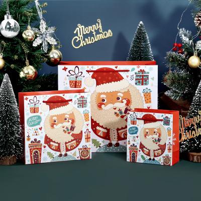 China Handmade Custom Biodegradable Paper Gift Bags Christmas Printing Custom Shopping Packaging Paper Bag for sale