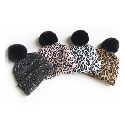 China 2021 COMMON wholesale fur pom pom hat knitted beanies winter leopard custom hats for women for sale