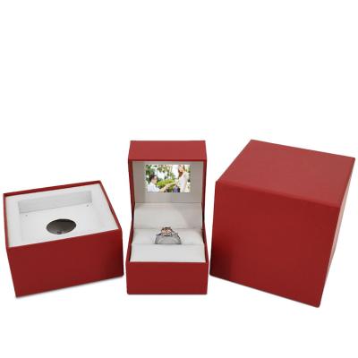 China Luxury Eco-friendly Screen Jewelry Boxes LCD Display Jewelry Packaging Red Color Video Jewelry Ring Box for sale