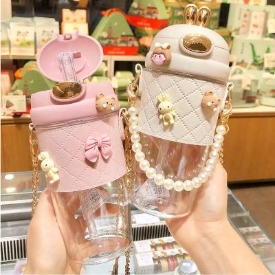 China Sustainable 380ml 580ml Cute Bunny Ear Water Bottle Cup Ins Plastic Girl Kids Portable Plastic Bottle With Straw Beads Metal Chain Strap for sale