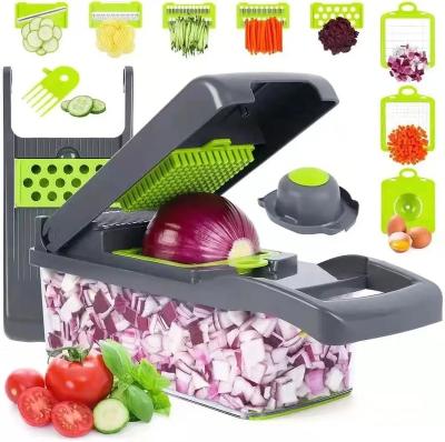 China Best Viable Sell 12 in 1 Hand Held Multifunctional Onion Cutter Fruit Vegetable Slicer Potato Peeler Manual Cleaver for sale