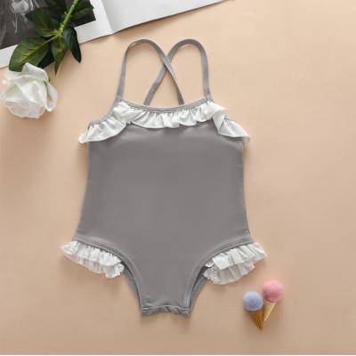 China 2021 INS Girls Swimwear Sling Breathable Solid Color One Piece Swimsuit for sale